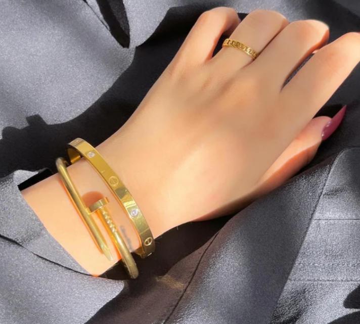 Nail And Cartier Bangle